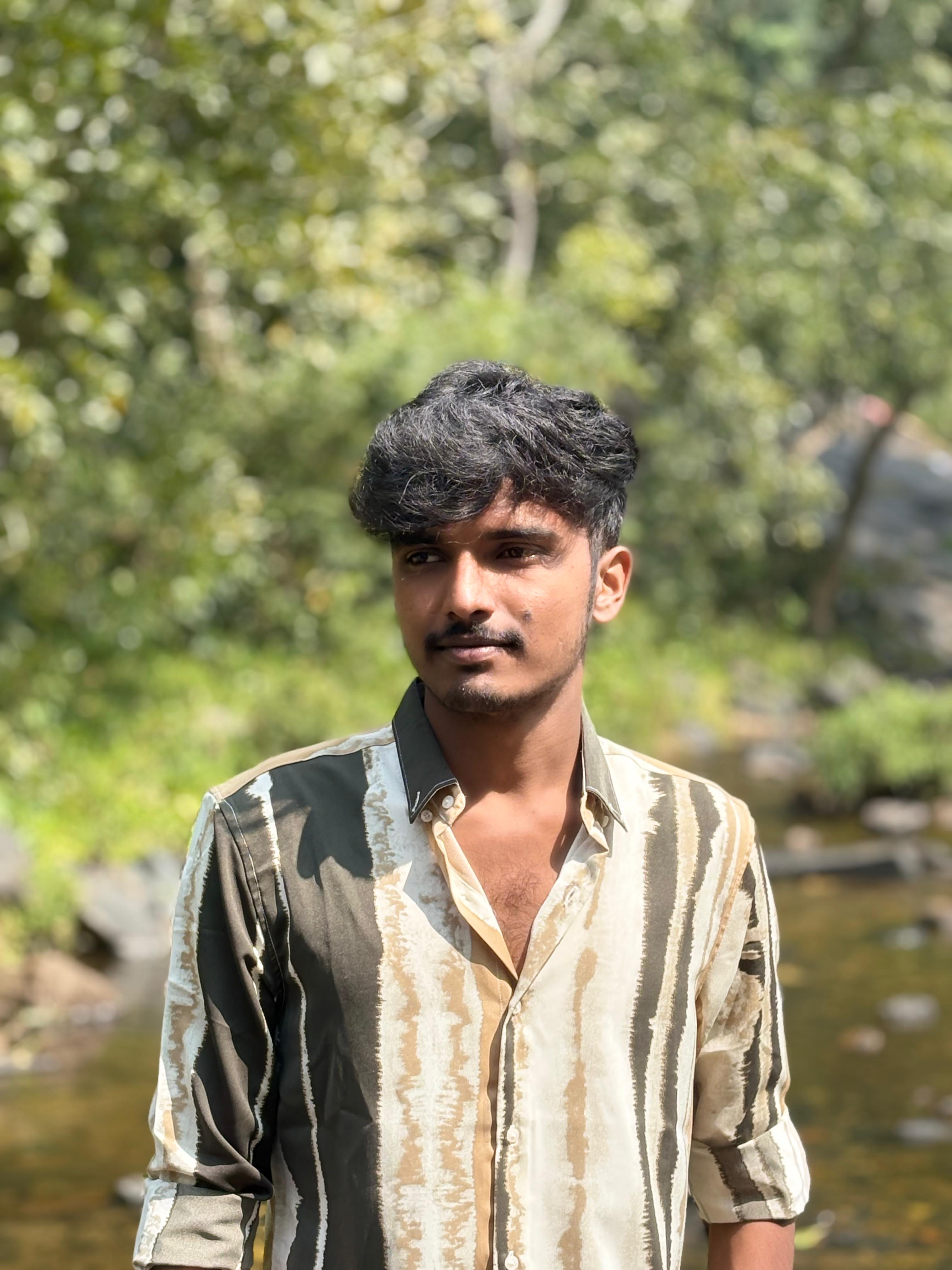 A candid photo of Malai Raj R